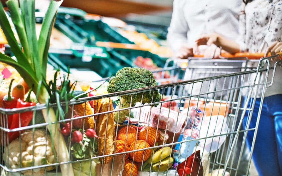 Healthy Benefits Plus couple shopping for fresh produce.