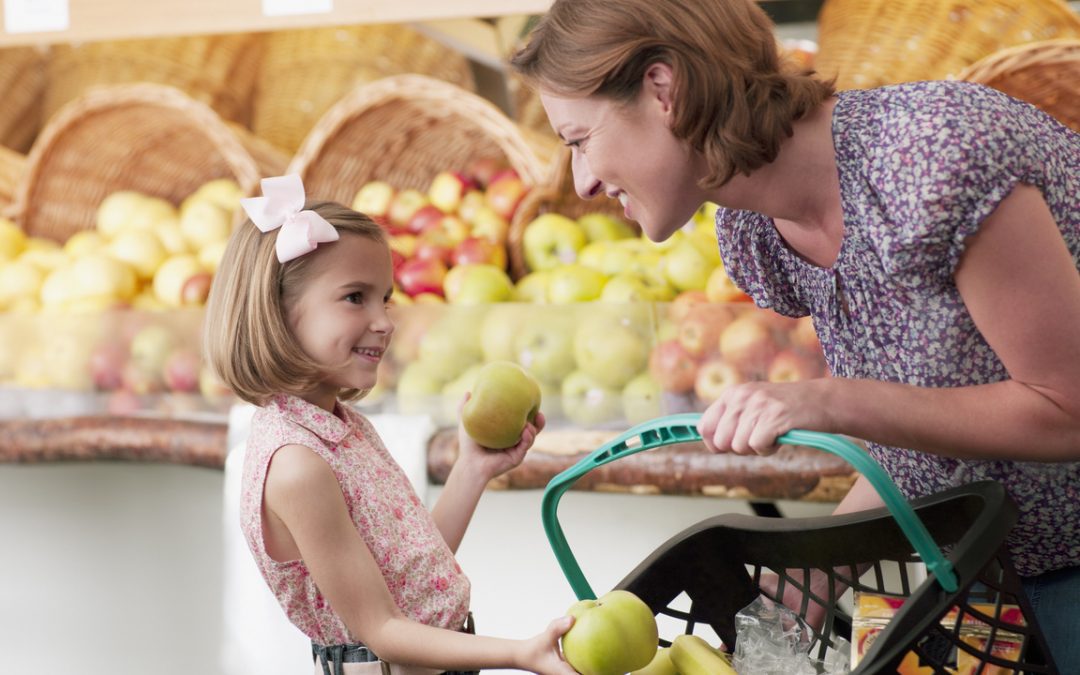 Program members shopping for fresh produce.