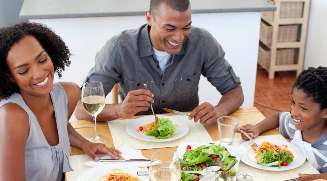 Family enjoying healthy salads from their food benefits