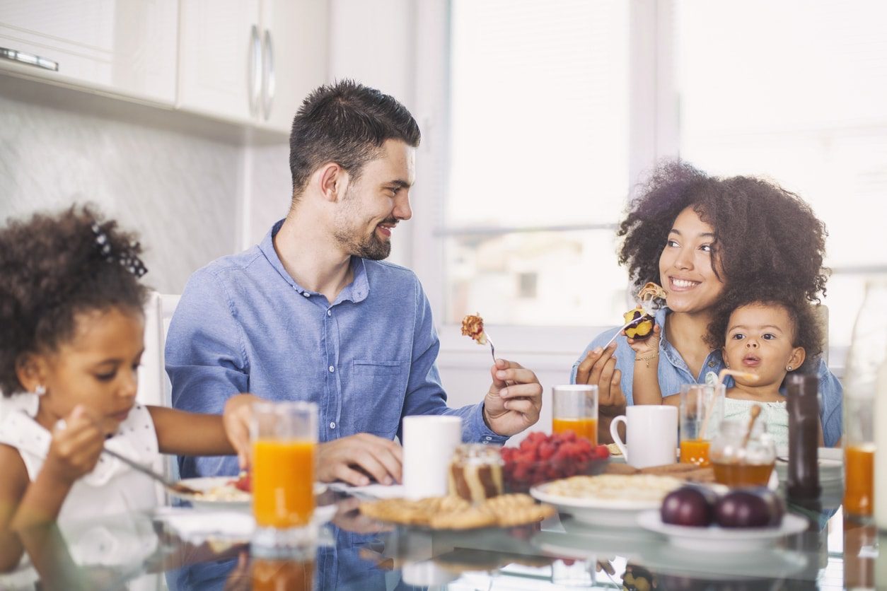 Food insecure family enjoys a meal with their benefits