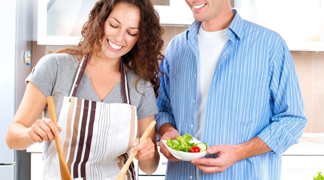 Young couple making food from their government benefits.