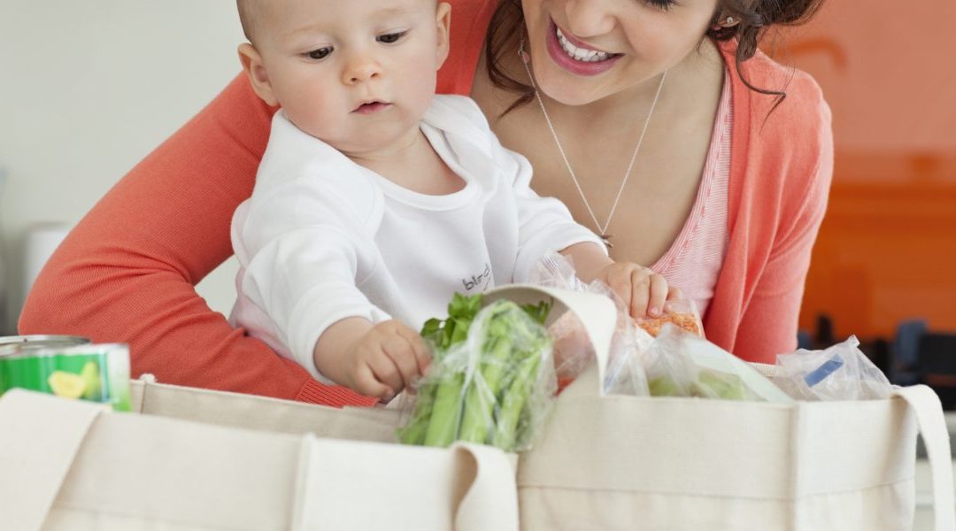 WIC Mother unpackaging new Healthy grocery items