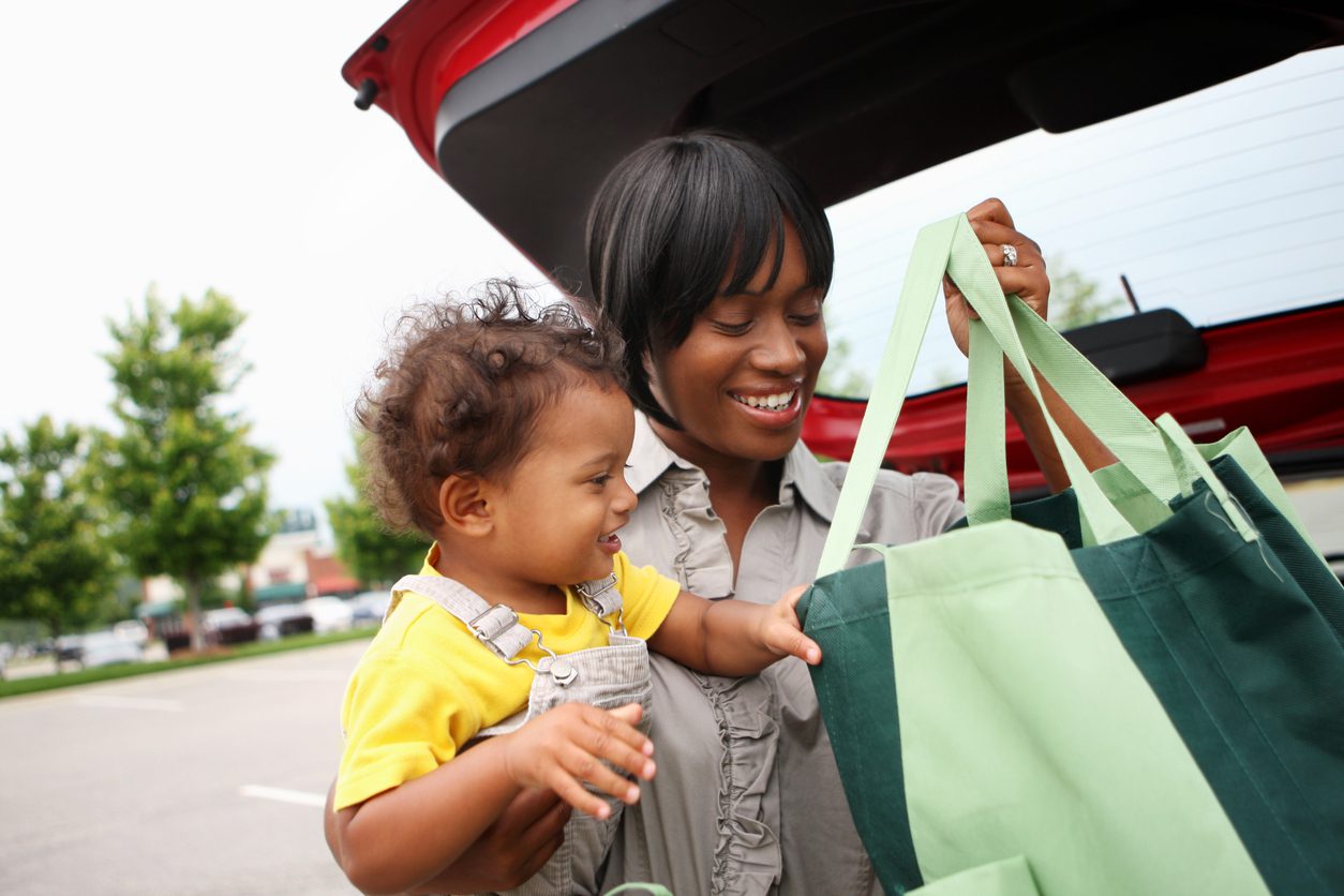 Grocery shopping Mother and son shopping with eWIC card